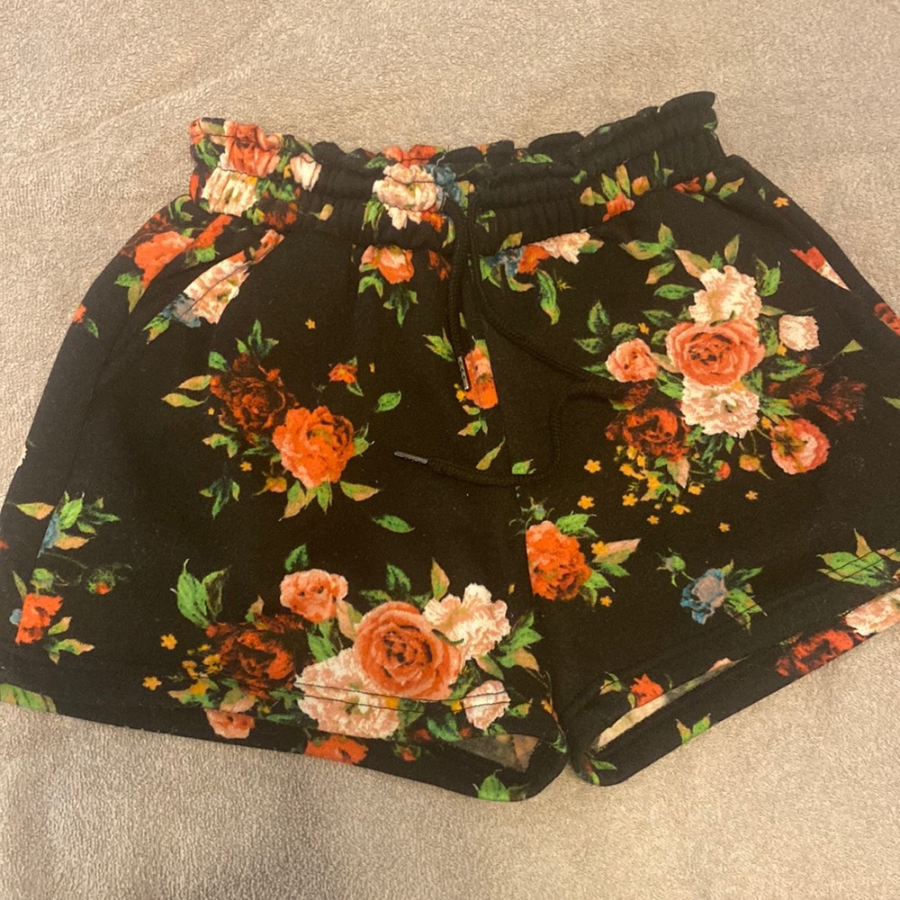 black lounging shorts with floral print